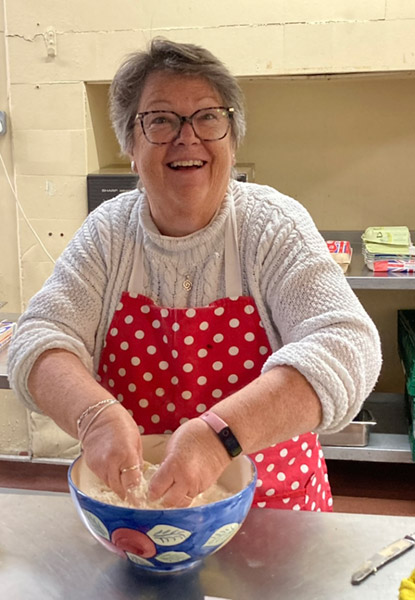 Floods Foodbank volunteer baking